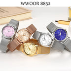 Montre de luxe dorée élégante avec diamants pour femme