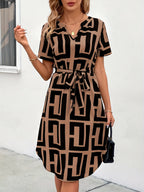 Robe à carreaux col en V manches courtes avec ceinture élégante