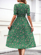 Robe florale bohème à manches bouffantes et col rond