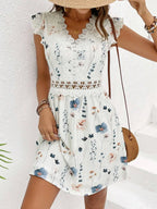 Robe courte en dentelle élégante sans manches à fleurs pour femme