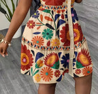 Robe chemise fleurie courte évasée à manches bouffantes