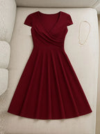 Robe élégante col rond manches courtes taille haute