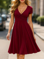 Robe élégante col rond manches courtes taille haute