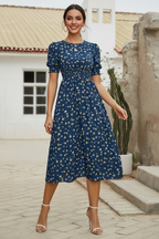Robe florale bohème à manches bouffantes et col rond