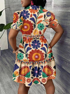 Robe chemise fleurie courte évasée à manches bouffantes