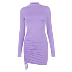 Robe moulante à manches longues et col rond de couleur unie