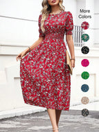 Robe florale bohème à manches bouffantes et col rond